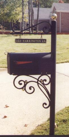 wrought iron mailbox and post