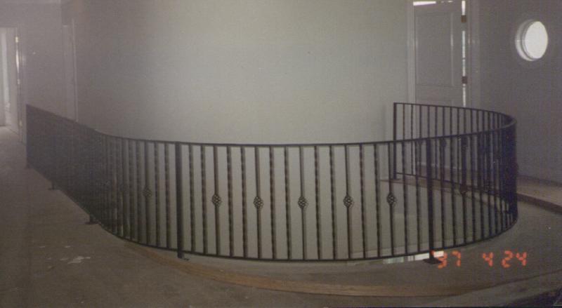 curved wrought iron rail