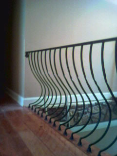 ornamental iron belly picket railing
