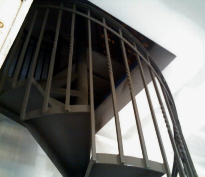 interior spiral stairway detail view of railing