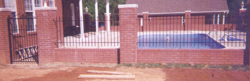 wrought iron gate and fence