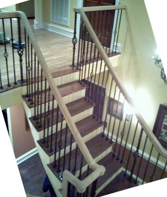 wrought iron railing with oak handrail