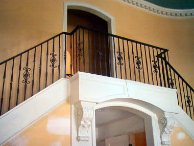 wrought iron railing with forged pickets